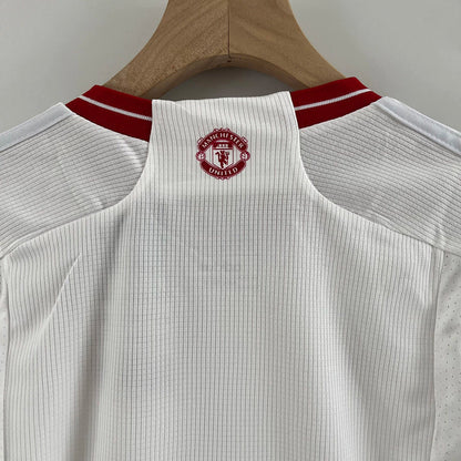 MANCHESTER UNITED II 23/24 CONJUNTO INFANTIL - TIENDA DEL JUGADOR
